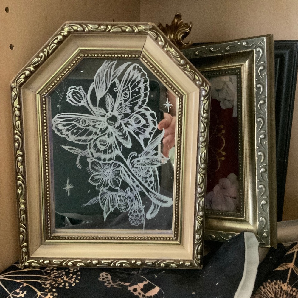 Hand tattooed moth mirror